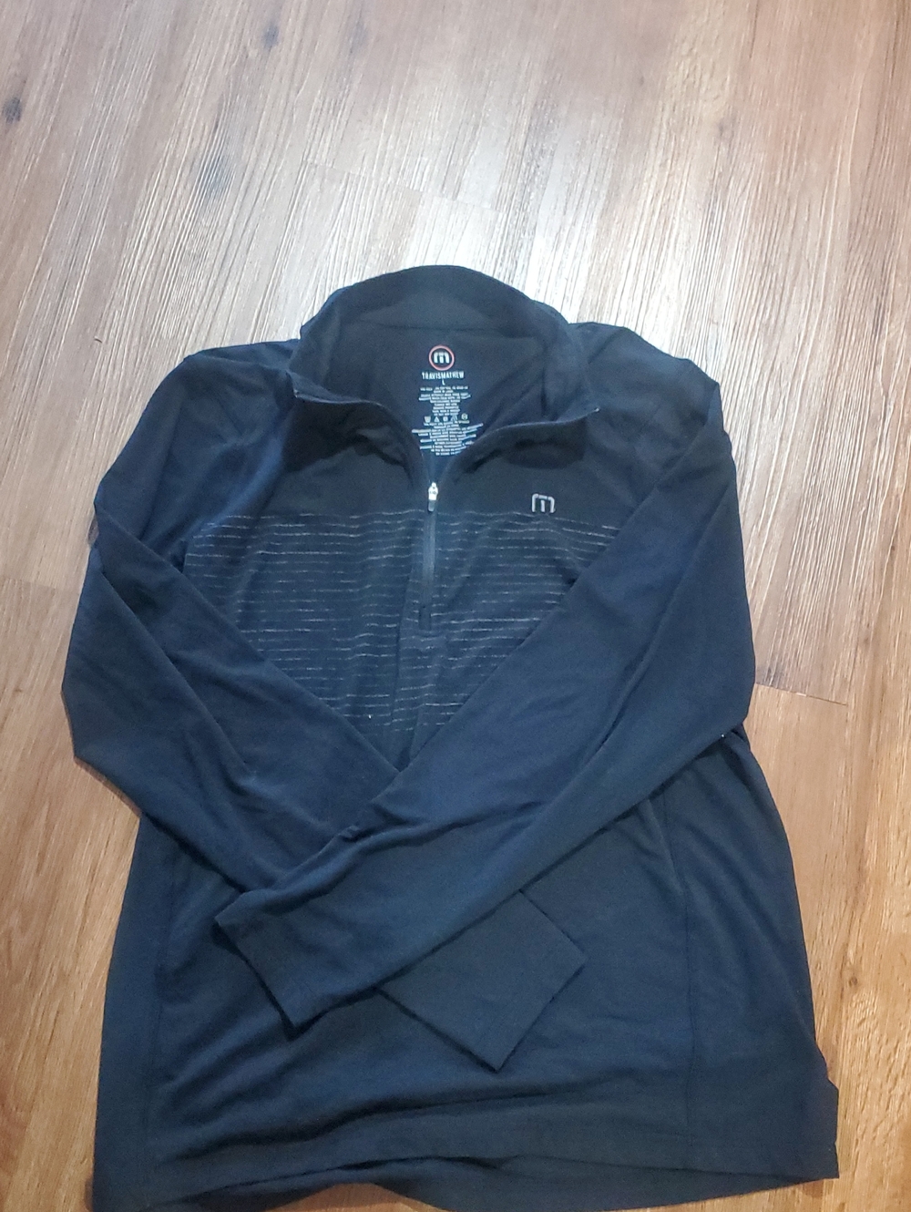 TravisMathew Black Zip Pullover with Logo Print